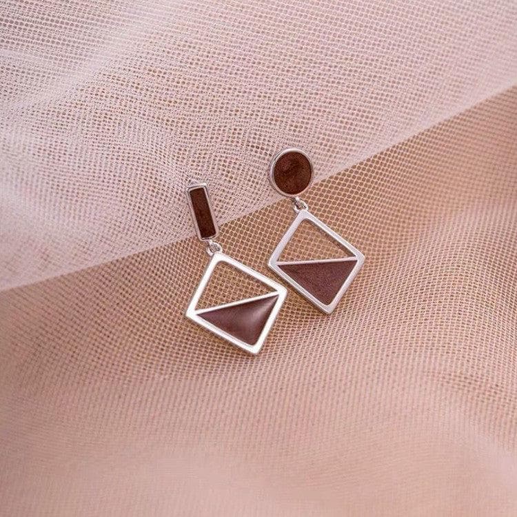 925 Silver Asymmetrical Earrings: Brown Love Knot Design