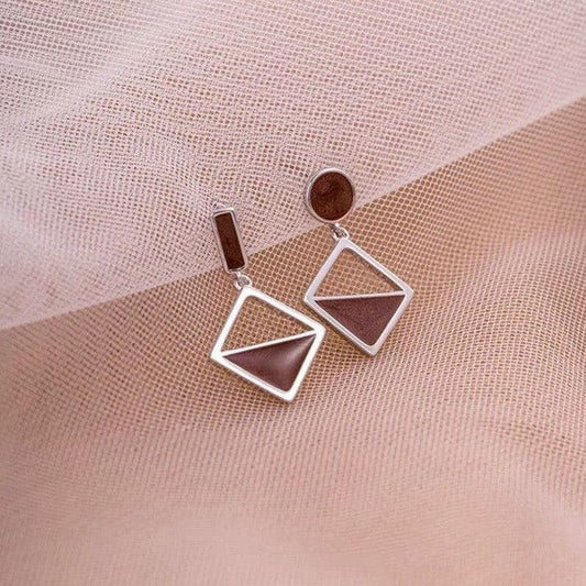 925 Silver Asymmetrical Earrings: Brown Love Knot Design