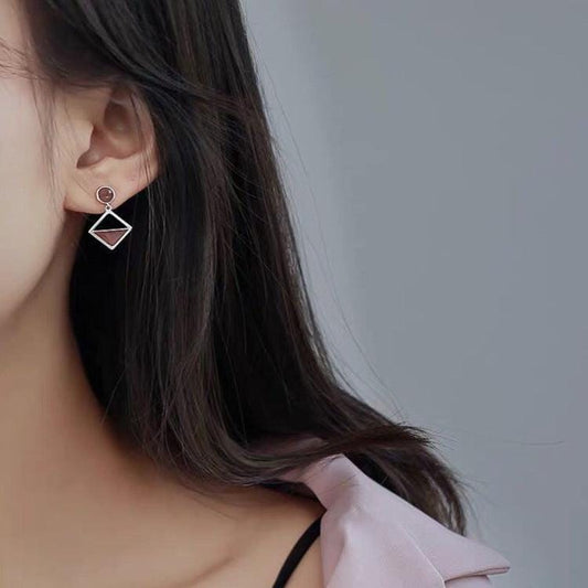 925 Silver Asymmetrical Earrings: Brown Love Knot Design